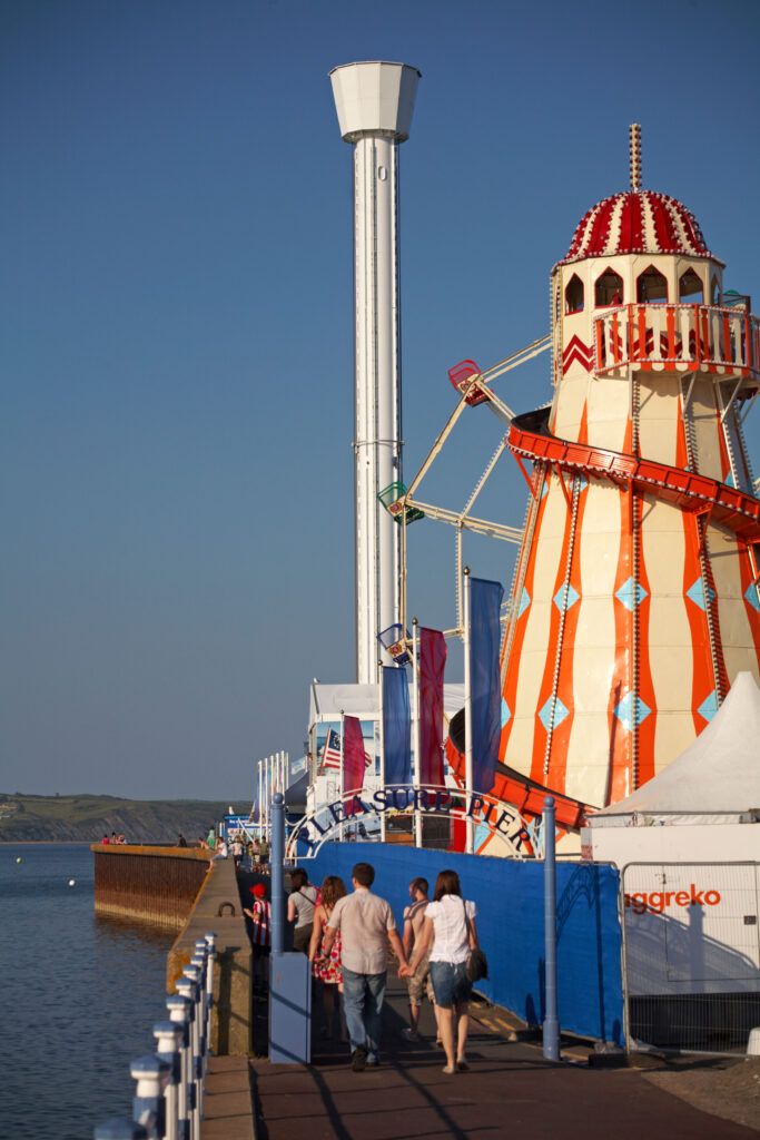 Visitors going on to the Pleasure Pier at Weymouth towards the Sea Life ...